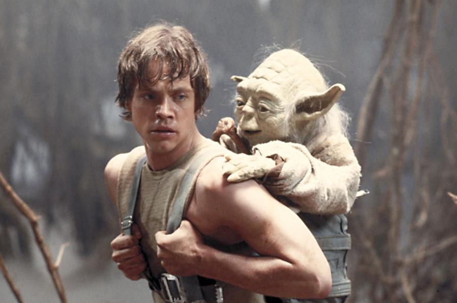 ORG XMIT: NYET475 FILE - This 1980 publicity image originally released by Lucasfilm Ltd., Mark Hamill as Luke Skywalker and the character Yoda appear in this scene from "Star Wars Episode V: The Empire Strikes Back." (AP Photo/Lucasfilm Ltd)