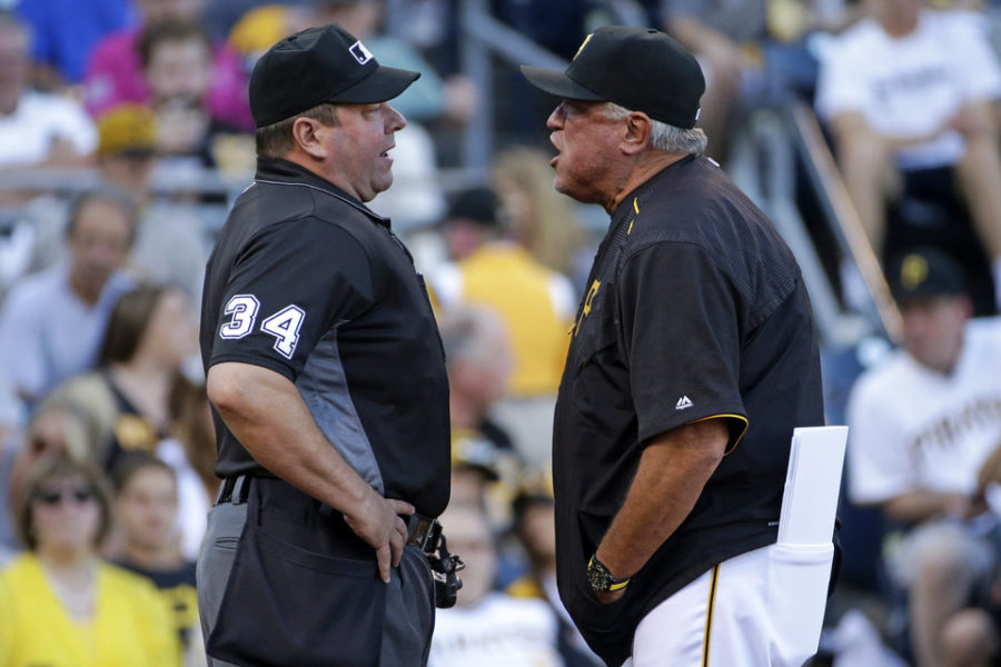 Pittsburgh Pirates manager Clint Hurdle, right, speaks his mind to umpire Sam Holbrook after being ejected during the first inning of a baseball game against the Milwaukee Brewers in Pittsburgh, Wednesday, July 20, 2016. (AP Photo/Gene J. Puskar)